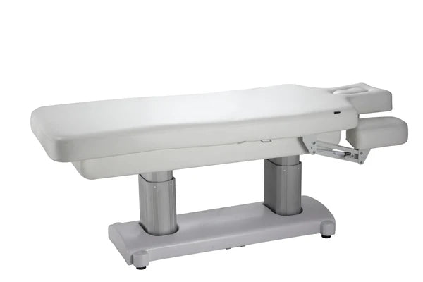 The Karma Hunterville (file 2249-A66.jpg) is a charcoal 4-motor electric beauty bed featuring a dual-column lifting system, adjustable headrest with breath hole, and integrated heating for professional salon treatments.