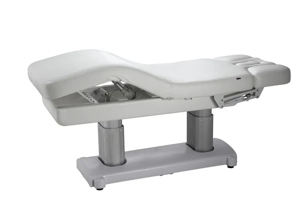 The Karma Hunterville (3-240H5154200357.jpg) is a premium white 4-engine electric beauty bed featuring dual-column lifting, integrated heating, and a built-in breath hole for professional spa treatments.