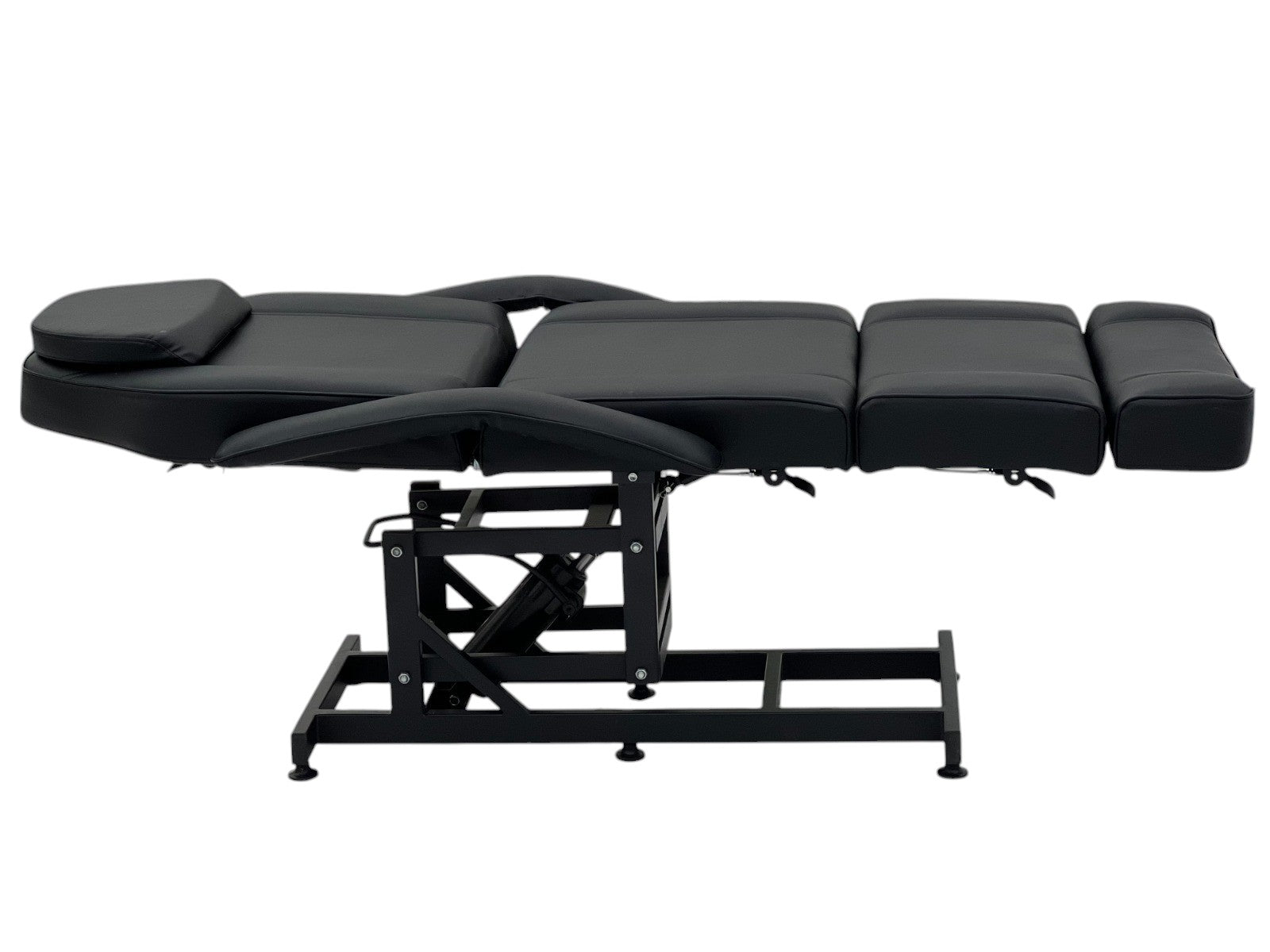 The Karma Taupo is a black hydraulic beauty bed featuring an adjustable back, leg sections, Trendelenburg tilt, and medical-grade antimicrobial vinyl.