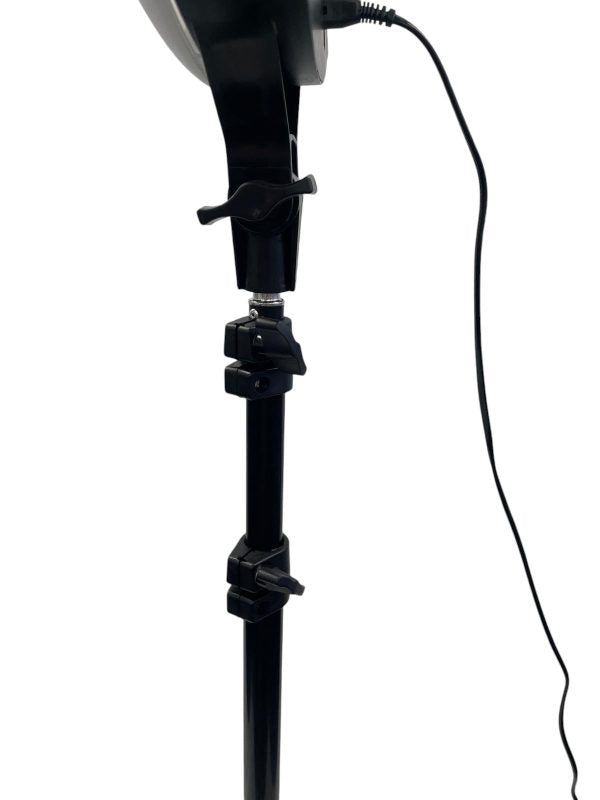 The Karma Ring Beauty Light is an 18-inch black LED ring light mounted on an adjustable floor tripod stand with a built-in central mirror interface.