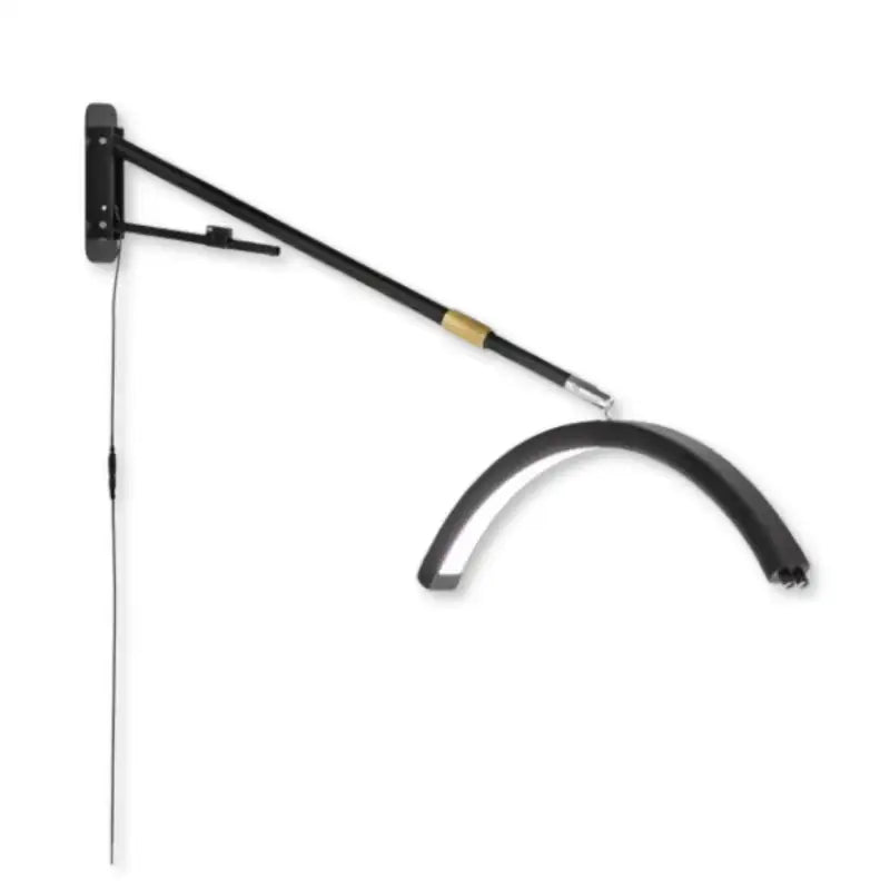 The Karma Wall Mount LED Half Moon Light is a white 23-inch curved arc beauty lamp featuring an adjustable wall-mounted arm and a 300-piece LED array.