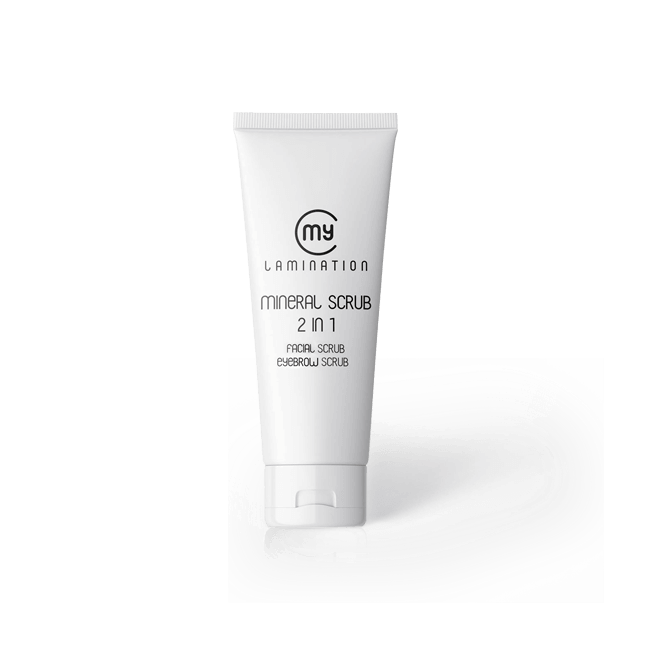 My Lamination Mineral Scrub 2-in-1 75ml tube shown with a pinkish creamy texture swatch and a model applying the exfoliant to her cheek for clear, refined skin.