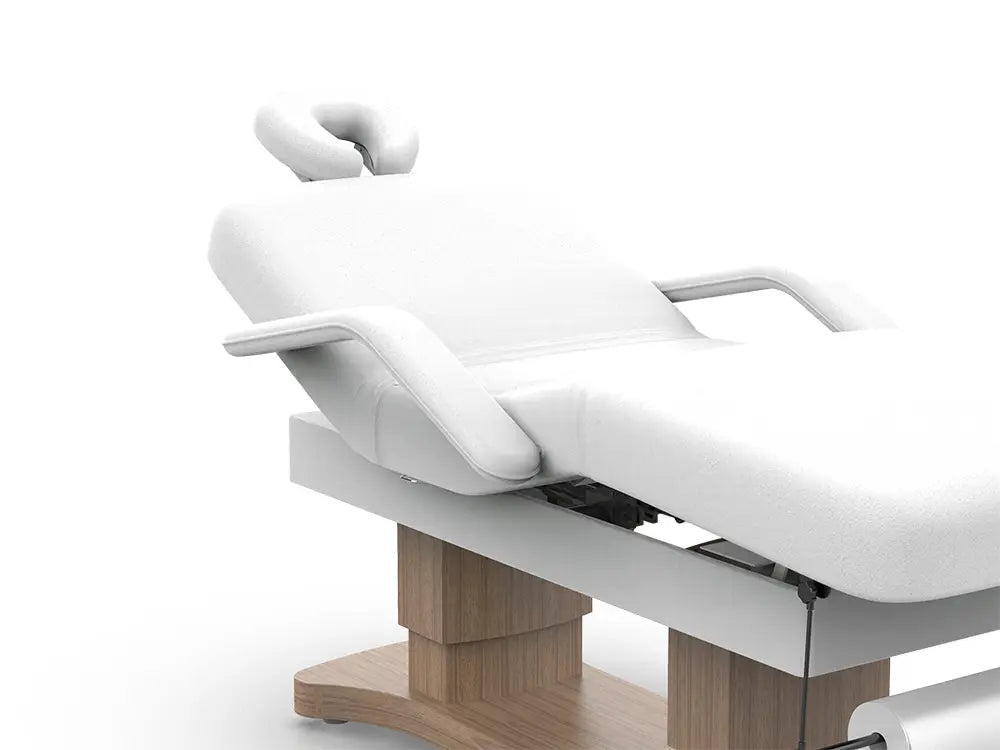 Karma Bethels Beach full electric white beauty bed with 3 motors, timber dual-pillar base, and integrated heating blanket for professional salon treatments.