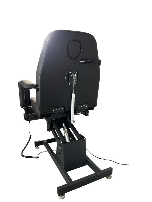 The Karma Hamilton V2 is a part-electric beauty bed featuring a sturdy pedestal base, removable armrests, and an adjustable headrest with a face hole.