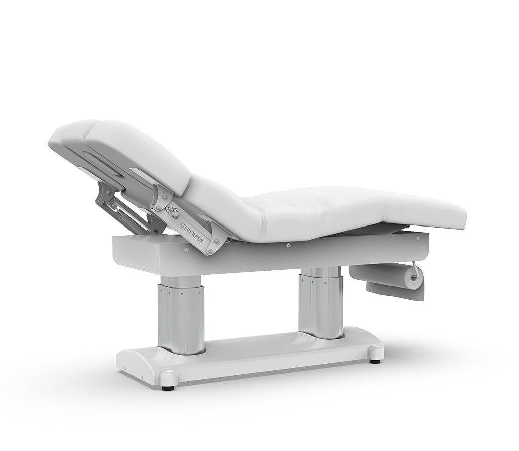 The Karma Hunterville (file 2249-A66.jpg) is a charcoal 4-motor electric beauty bed featuring a dual-column lifting system, adjustable headrest with breath hole, and integrated heating for professional salon treatments.
