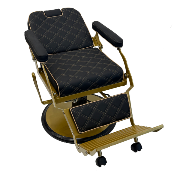 The Karma Paddington barber chair  features black diamond-quilted upholstery with gold-finished hardware and a heavy-duty hydraulic base.