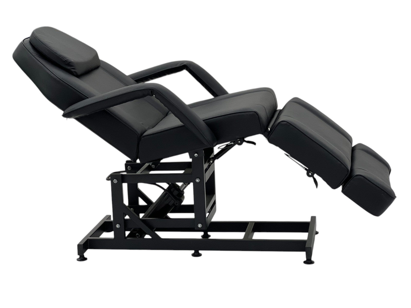 The Karma Taupo is a black hydraulic beauty bed featuring an adjustable back, leg sections, Trendelenburg tilt, and medical-grade antimicrobial vinyl.