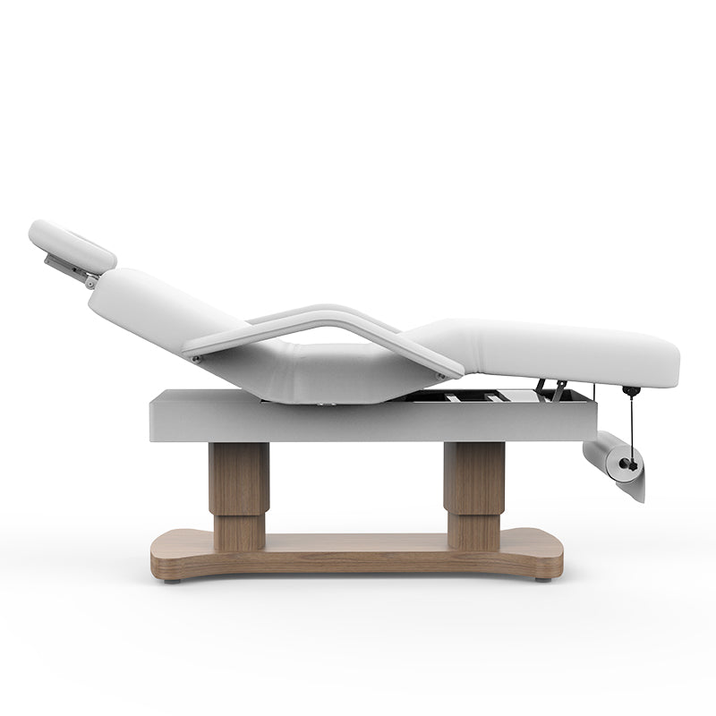 Karma Bethels Beach full electric white beauty bed with 3 motors, timber dual-pillar base, and integrated heating blanket for professional salon treatments.