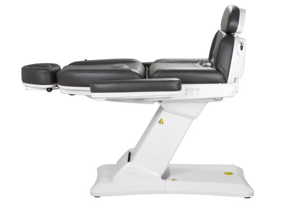 The Karma Christchurch black electric beauty bed featuring a 3-motor system, adjustable face cradle, and antimicrobial vinyl for professional laser and aesthetic treatments.