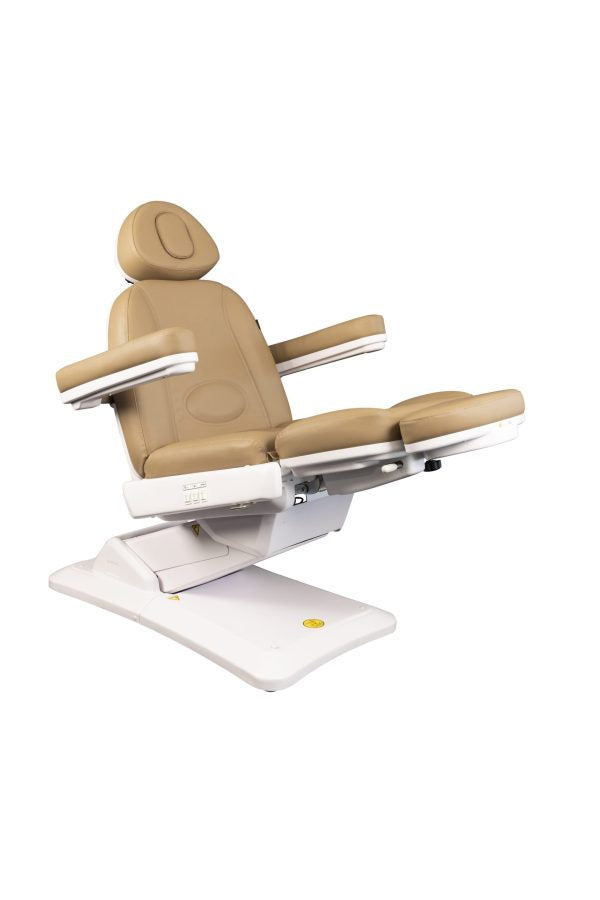 The Karma Christchurch is a premium sand-coloured 3-motor electric beauty and laser treatment table featuring an adjustable face cradle and tilting function.