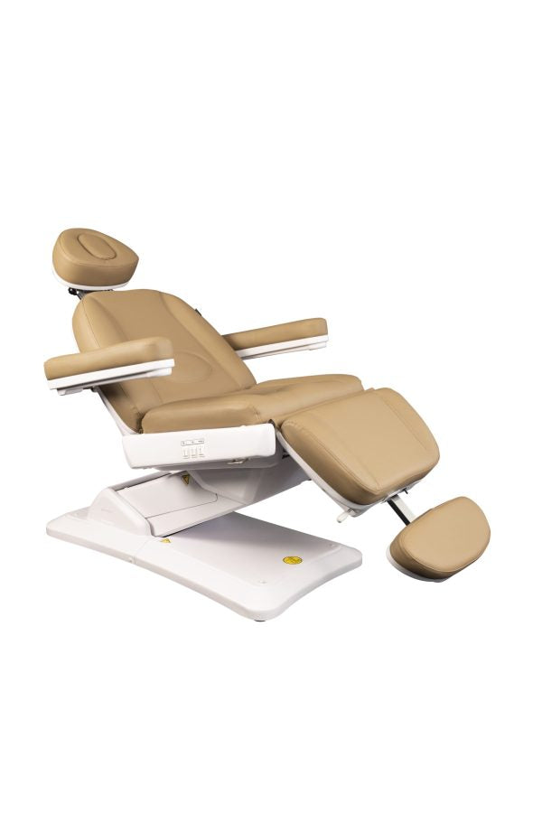 The Karma Christchurch is a premium sand-coloured 3-motor electric beauty and laser treatment table featuring an adjustable face cradle and tilting function.