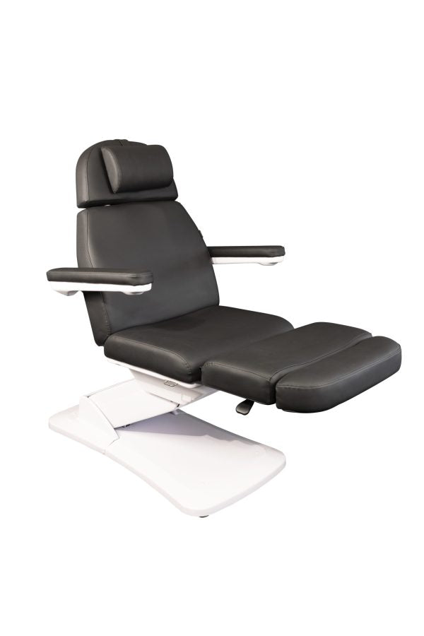 The Karma Dunedin is a premium sand electric beauty bed featuring three motors, an adjustable headrest with a face hole, and medical-grade antimicrobial vinyl.