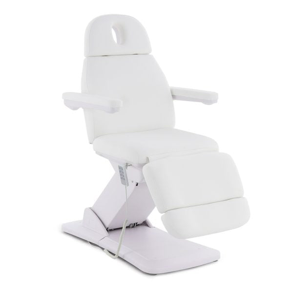 The Karma Dunedin is a premium white 3-motor electric beauty and medical treatment table featuring an adjustable headrest and antimicrobial vinyl.