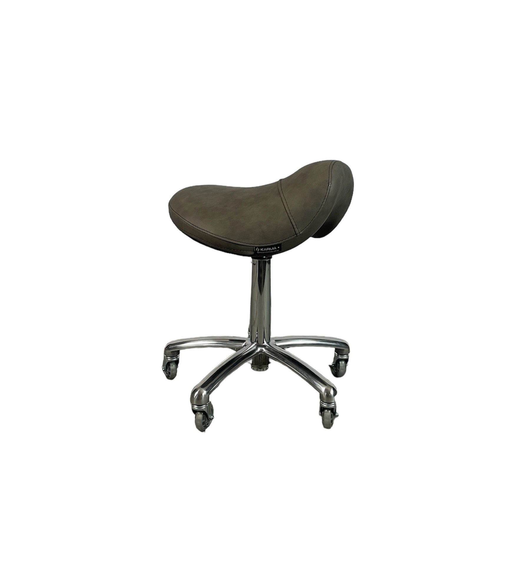 The Karma Evandale Saddle Stool features a contoured tan saddle seat, a polished aluminium base, and specialized hair-free rollerblade wheels.