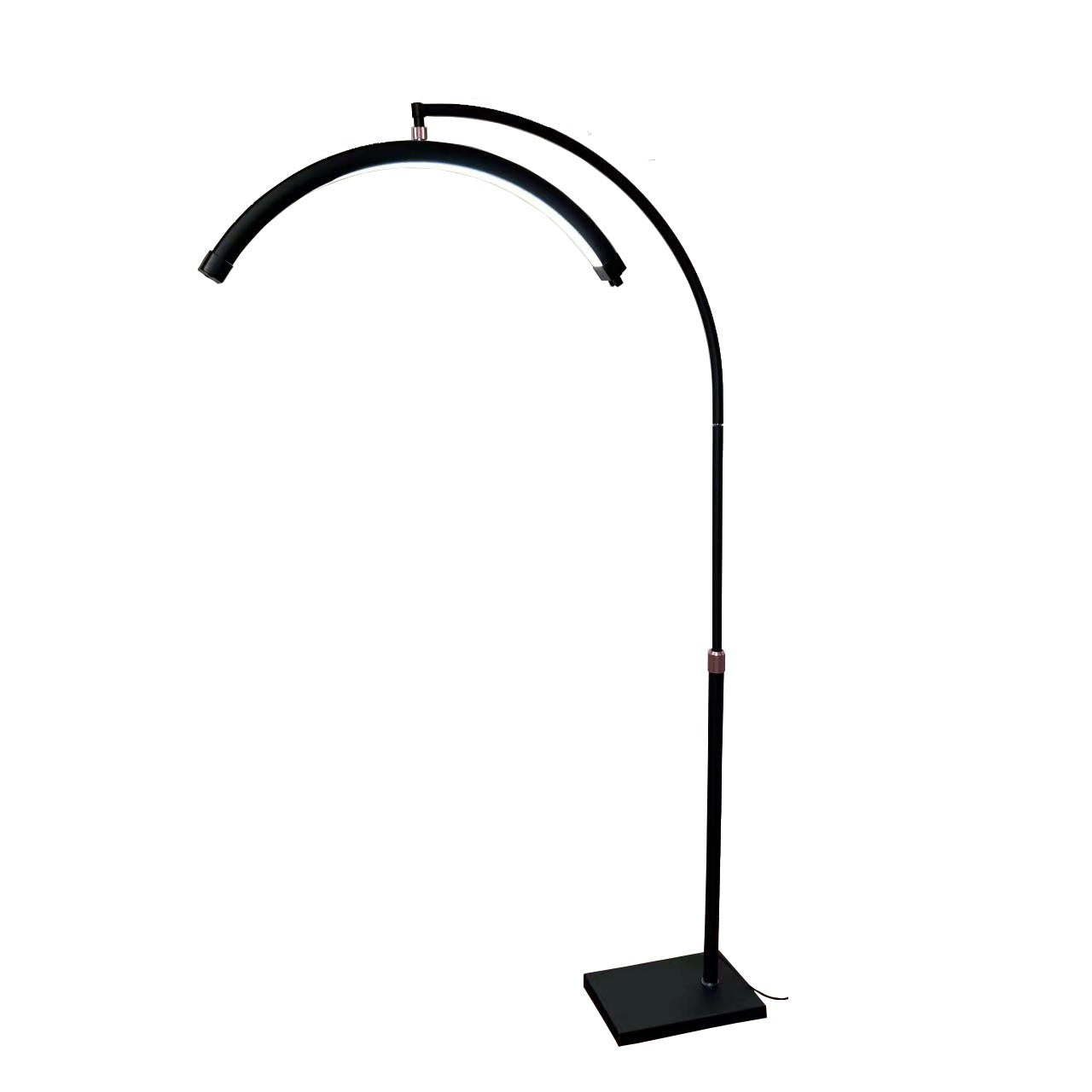 The Karma Half Moon Beauty Light is a black 28-inch wide curved arc treatment floor lamp featuring a low-profile flat base and internal hidden cable management.