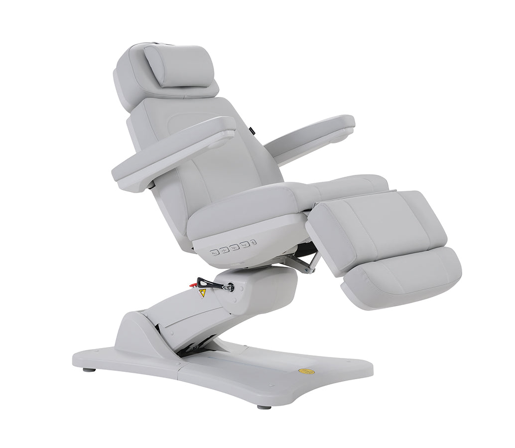 The Karma Inglewood is a premium white 4-motor electric beauty bed featuring a 240-degree swivel base and medical-grade antimicrobial vinyl.