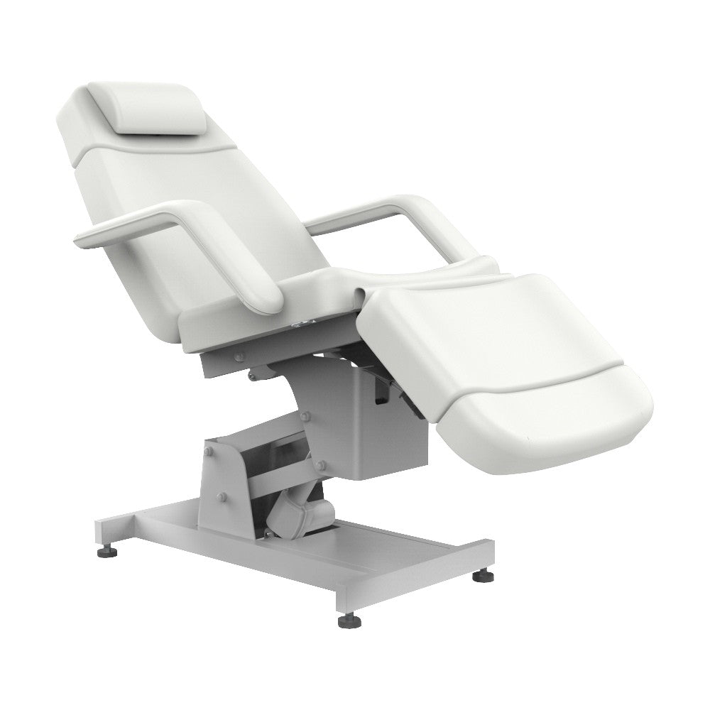 The Karma Invercargill is a premium white 4-motor electric beauty bed featuring a tilting function, adjustable headrest, and medical-grade antimicrobial vinyl.