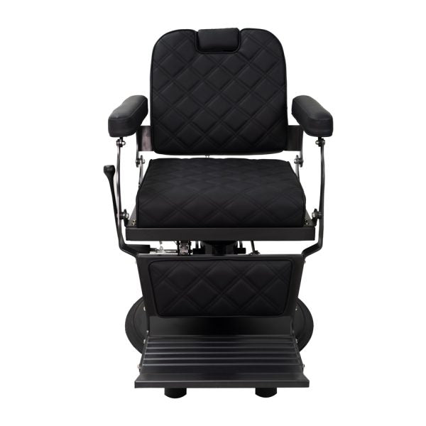 The Karma Paddington is a black barber chair with a heavy-duty base, 300kg rated hydraulic pump, and classic diamond-patterned quilted upholstery.