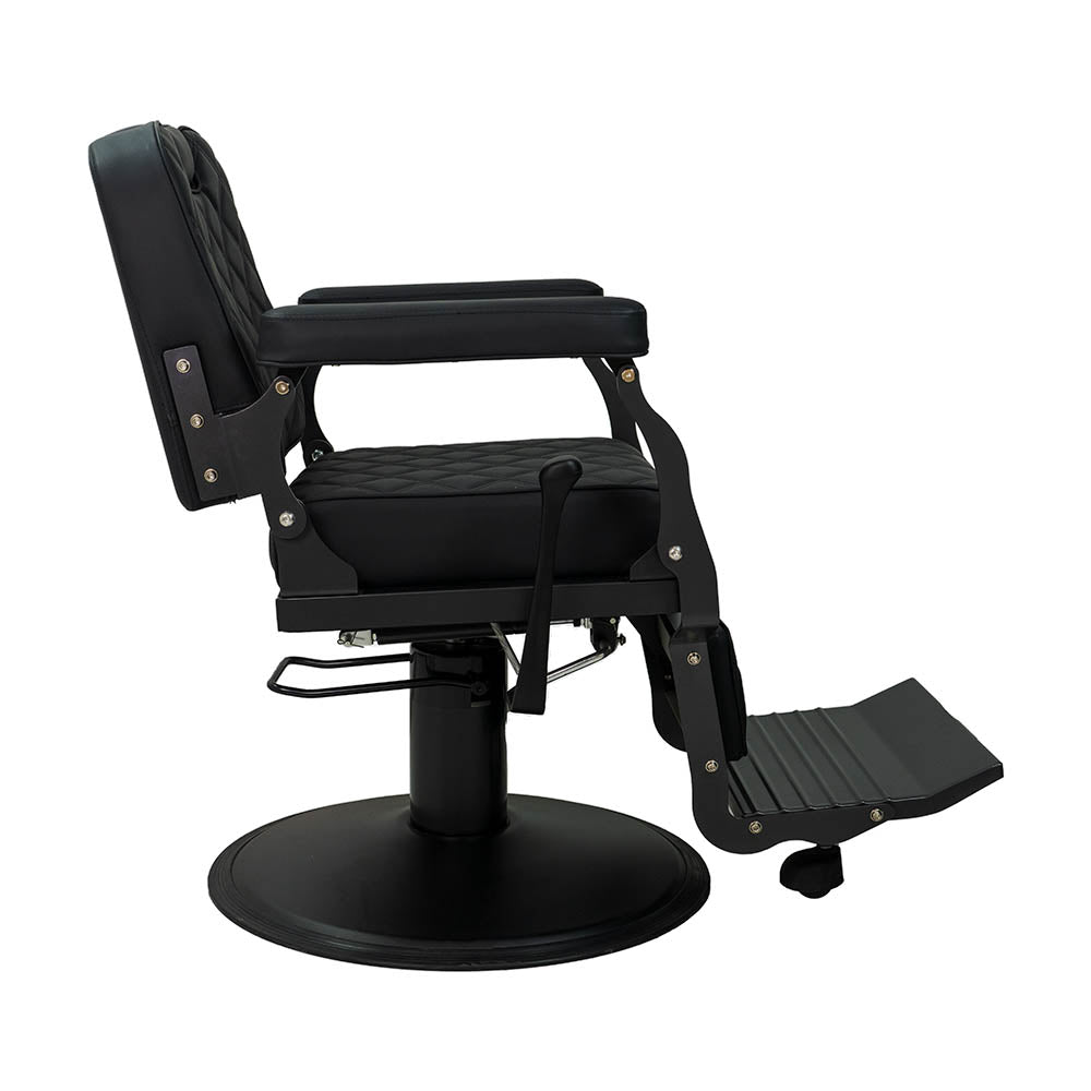 The Karma Paddington is a black barber chair with a heavy-duty base, 300kg rated hydraulic pump, and classic diamond-patterned quilted upholstery.