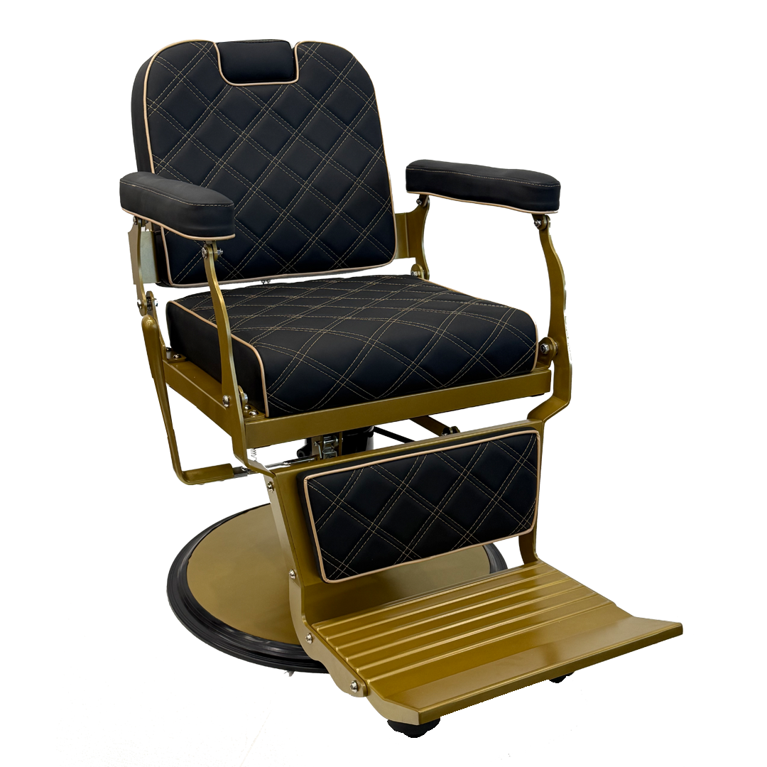 The Karma Paddington barber chair  features black diamond-quilted upholstery with gold-finished hardware and a heavy-duty hydraulic base.
