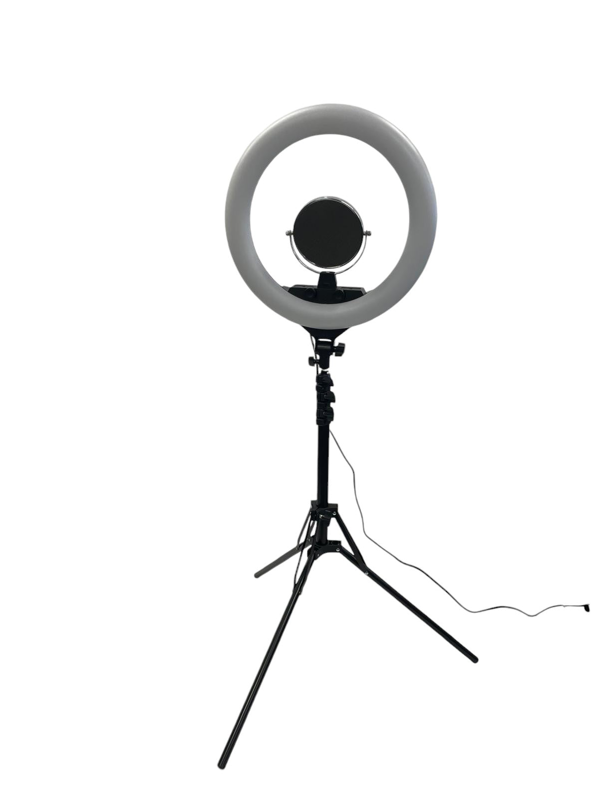 The Karma Ring Beauty Light is an 18-inch black LED ring light mounted on an adjustable floor tripod stand with a built-in central mirror interface.