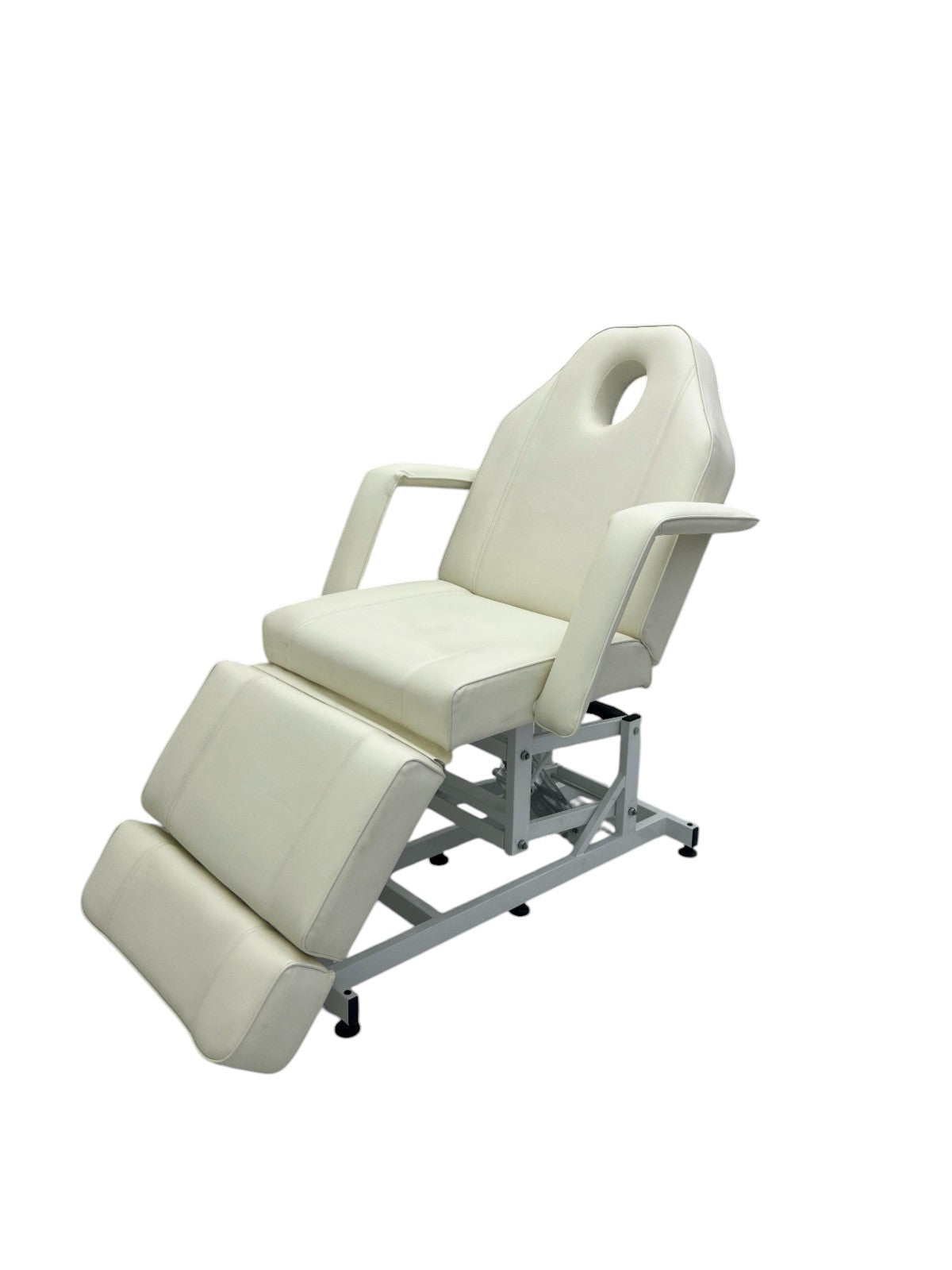 The Karma Taupo is a professional white hydraulic beauty bed featuring adjustable Trendelenburg tilt and antimicrobial vinyl.