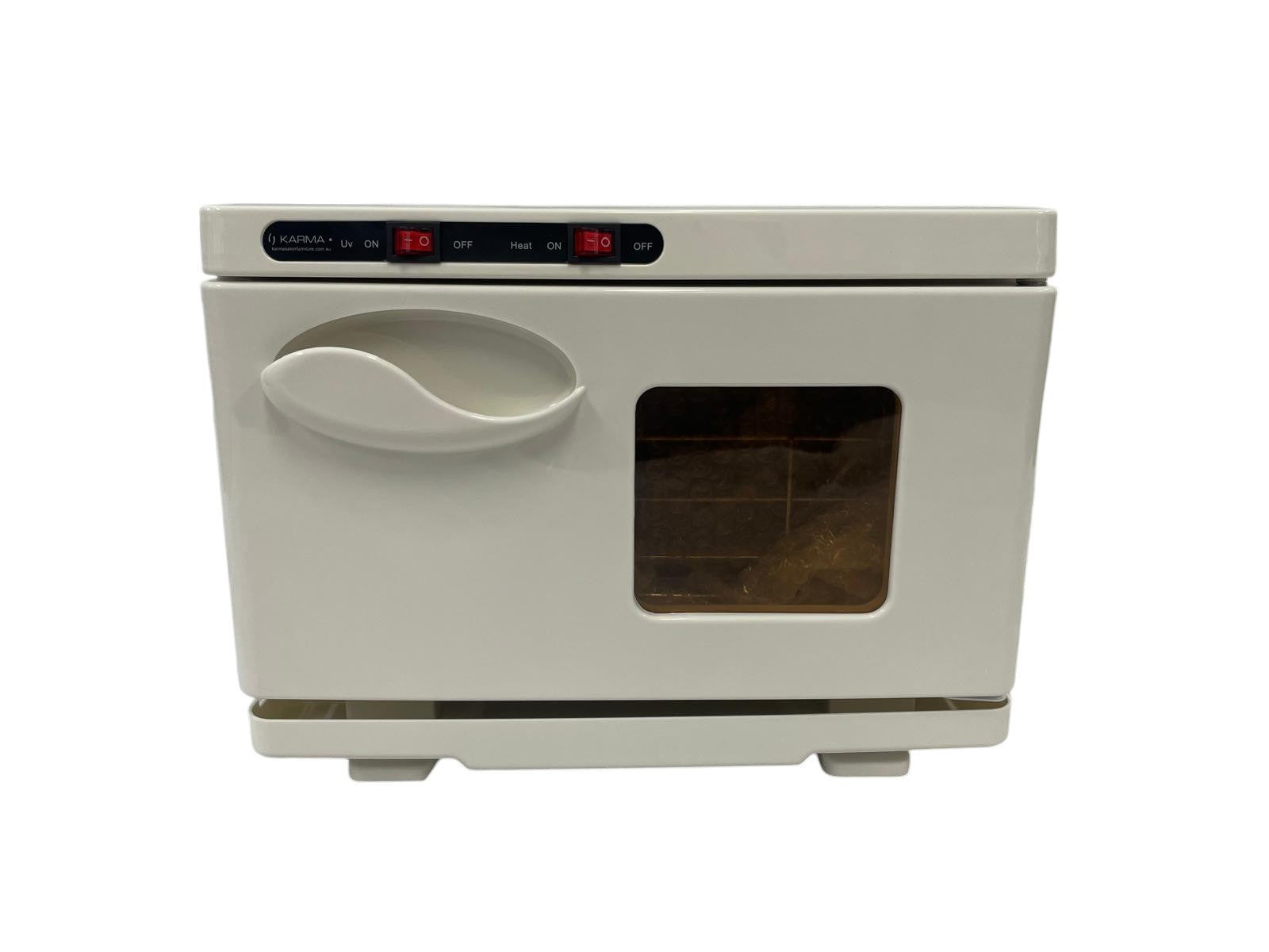 The Karma 8L UV Hot Towel Cabinet in professional gloss white, featuring independent UV and heat power switches, an viewing window, and a compact clinical benchtop frame.