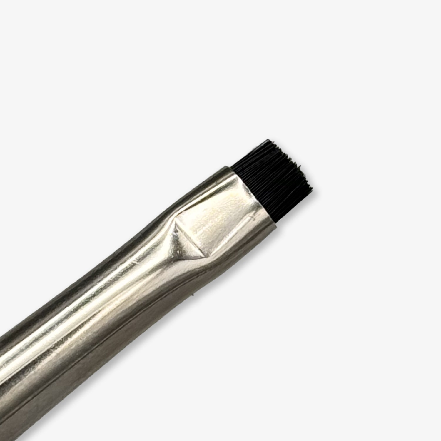 The My Lamination Icon Brush, a professional lash and brow tool with a matte black birch handle, silver ferrule, and ultra-thin semi-rigid bristles.